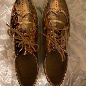 Liliana Rose Gold Wingtip Sneakers.  Size 8 1/2.